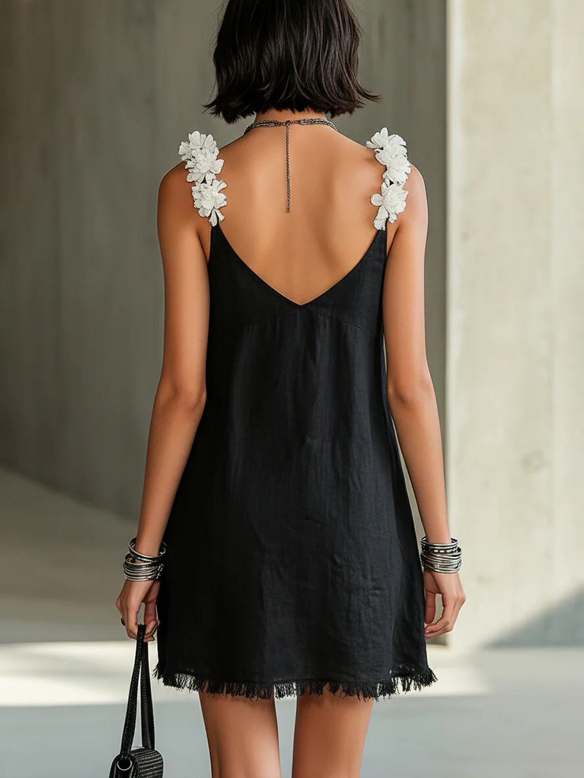 NOÉMIE | BLACK V-NECK MINI DRESS WITH FLORAL STRAPS