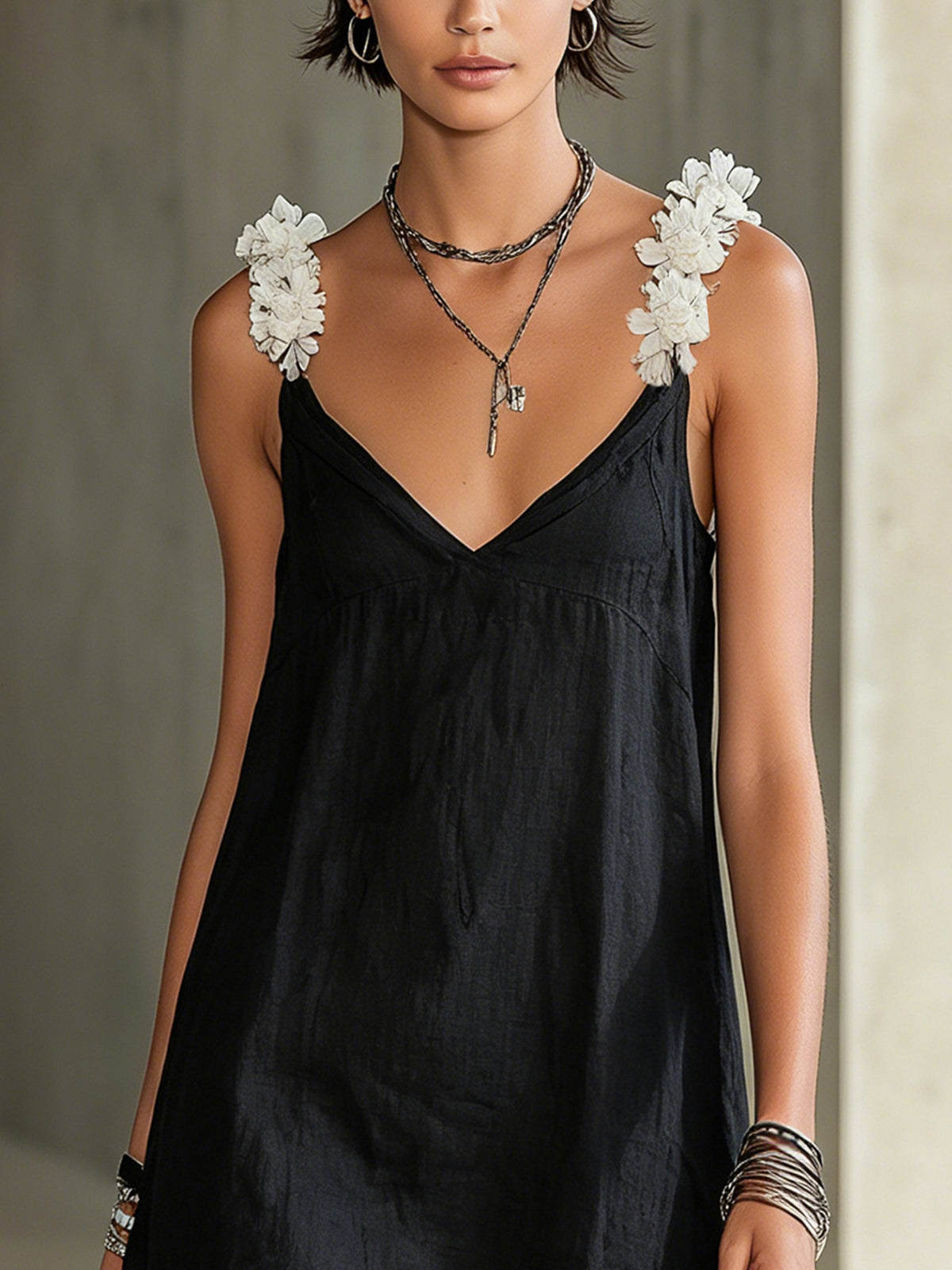 NOÉMIE | BLACK V-NECK MINI DRESS WITH FLORAL STRAPS