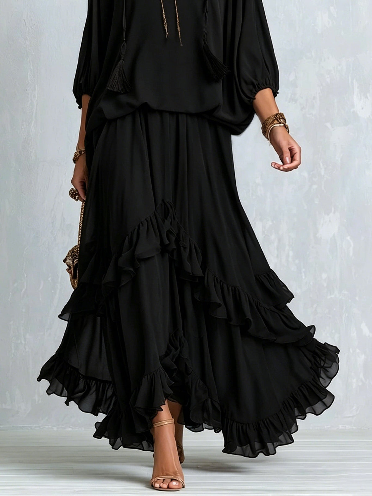 Tabitha black chiffon ruffle skirt set, close-up of layered ruffle maxi skirt in motion