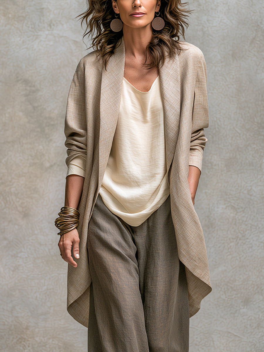Felicia layered three-piece set, close-up of beige draped open-front jacket