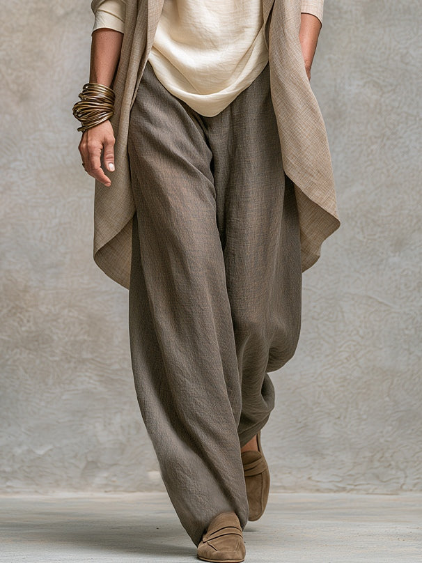 Felicia layered three-piece set, close-up of grey wide-leg palazzo trousers