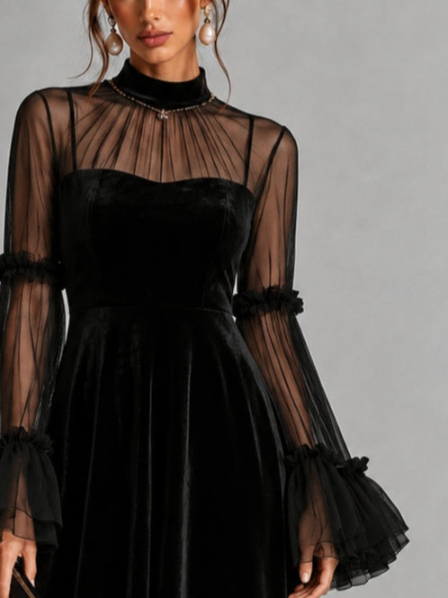 Stephanie black velvet midi dress, close-up of sheer sleeves with ruffle trim