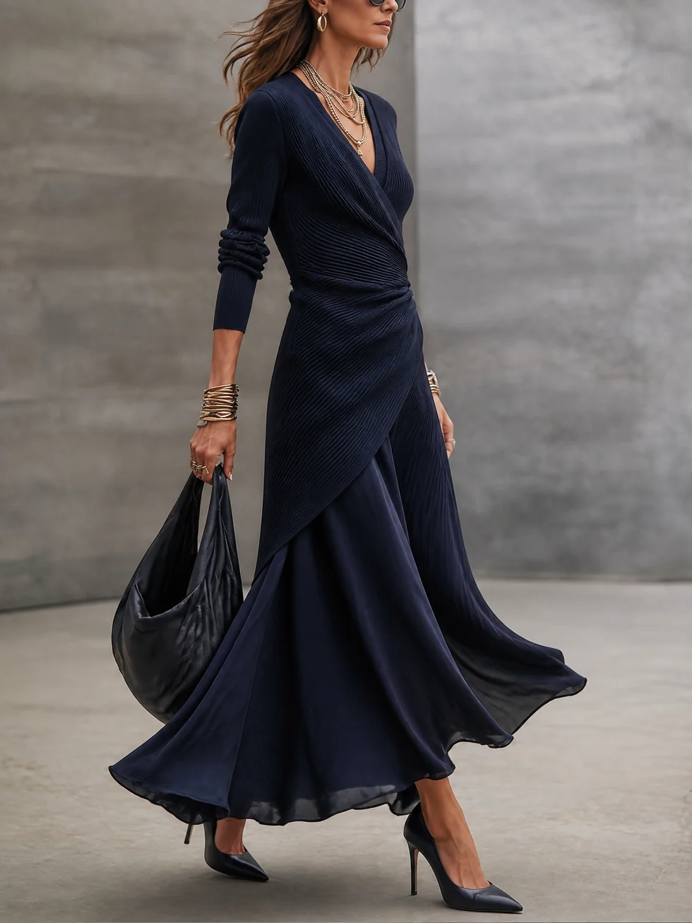 Annabella asymmetric satin maxi dress in navy, side view with skirt in motion