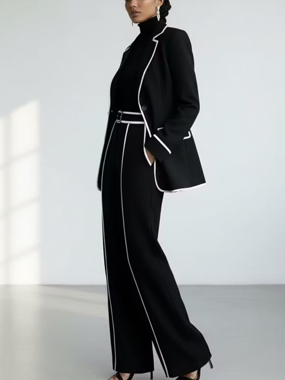 Claudia contrast-piped trouser suit in black, full-length side view