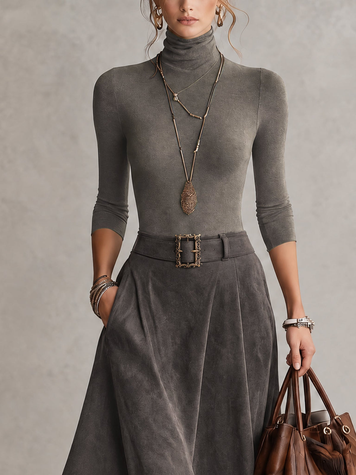 Delphina turtleneck top and asymmetric midi skirt set in grey, close-up view