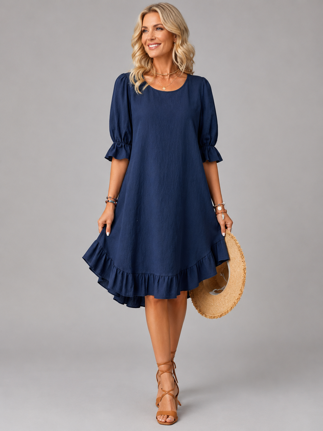 Gwen ruffle-hem swing dress in navy blue, full-length front view
