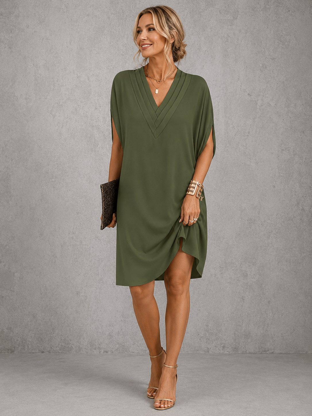Seren pleated V-neck shift dress in military green, full-length front view