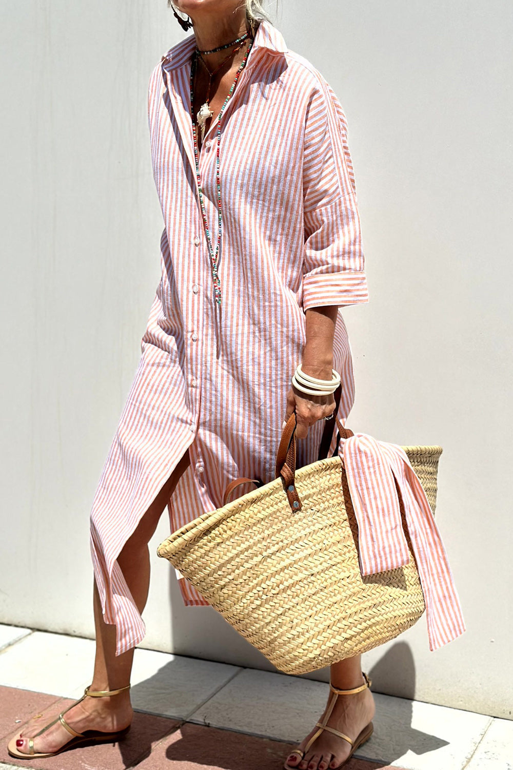Sally striped midi shirt dress in pink stripes, front view with side slit