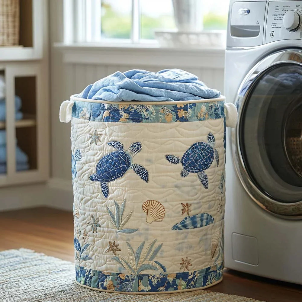 Consolata hand-quilted laundry basket with blue sea turtles and seashells, front view
