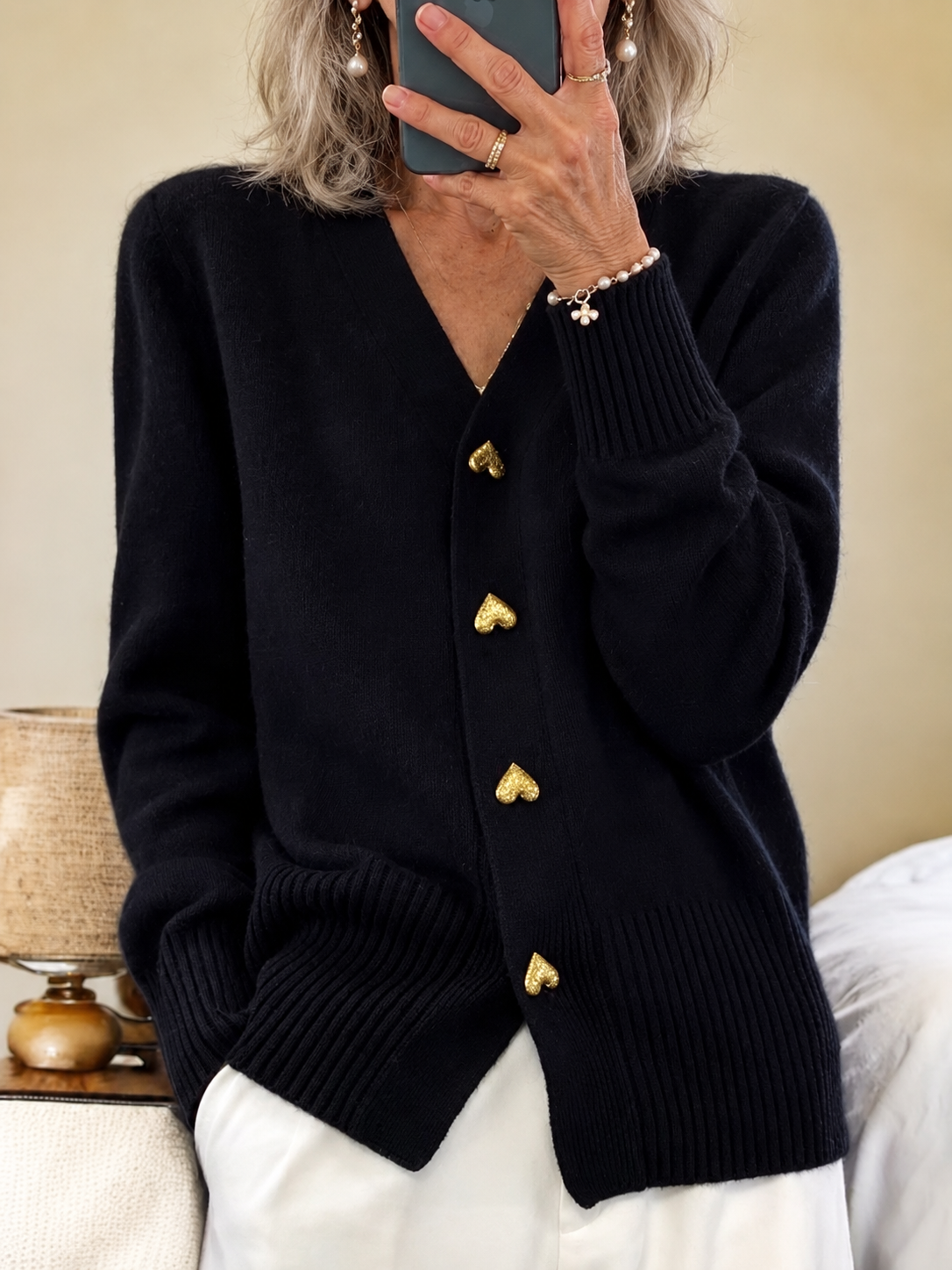 Elinor heart-button cardigan in black on mature model