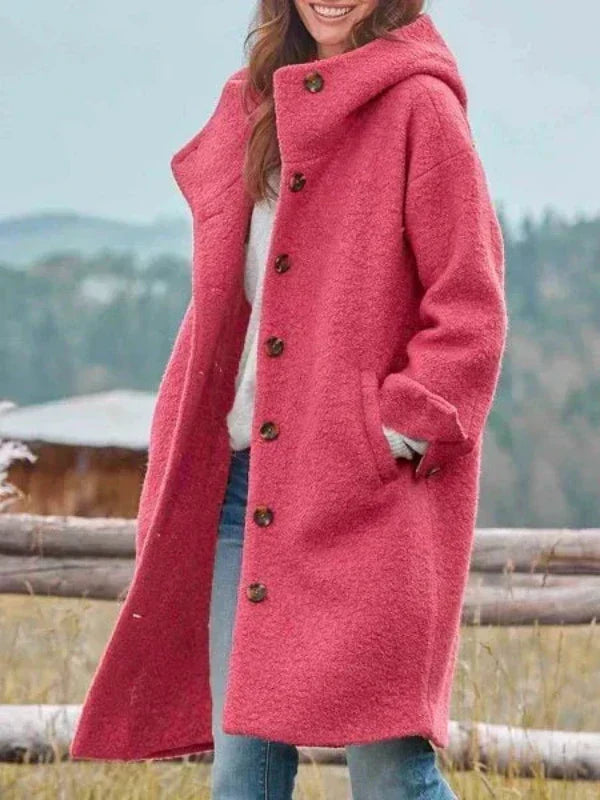 Virginia long hooded coat in pink, three-quarter view outdoors