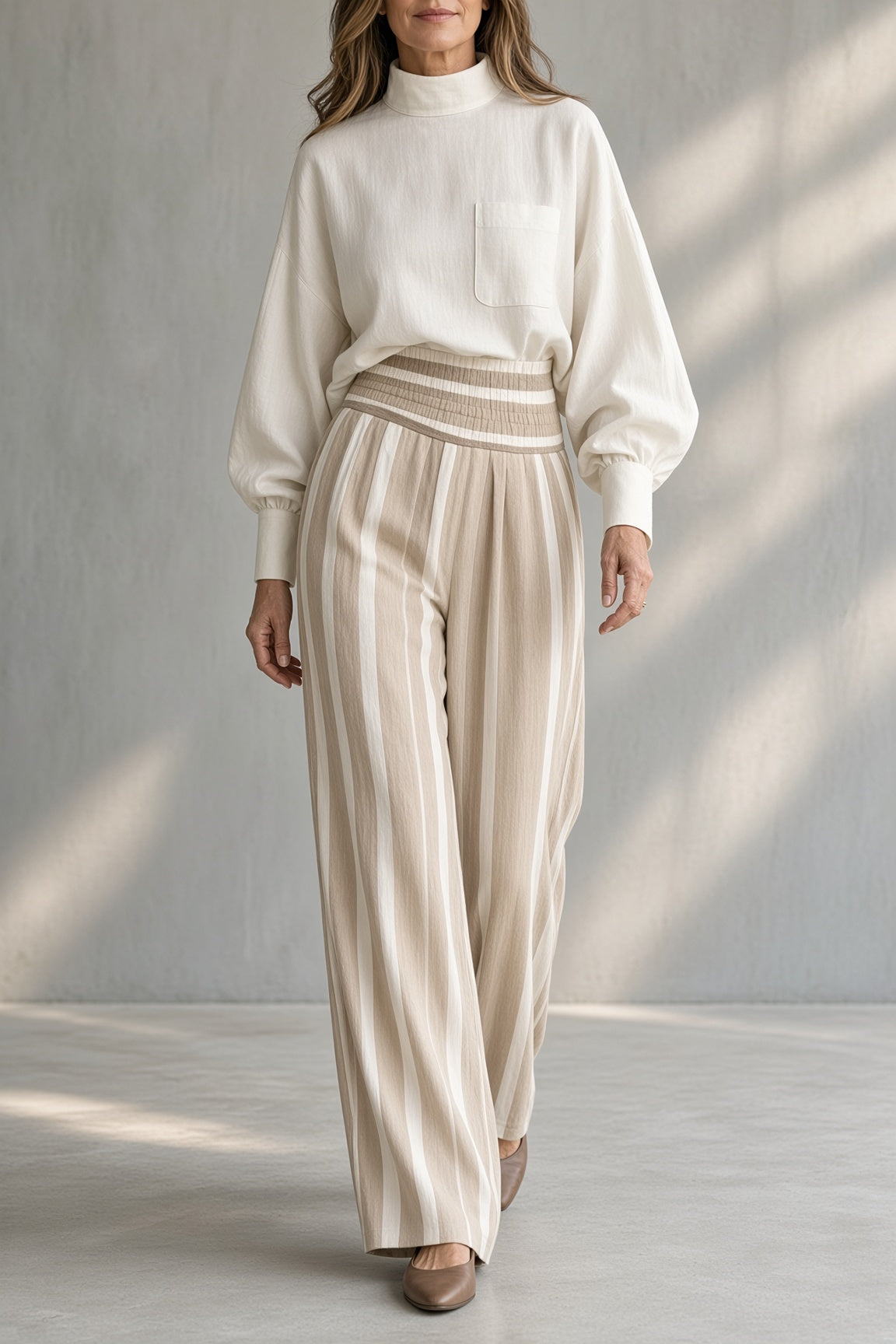 Rosaleen high-neck top and striped trouser set in white, front view