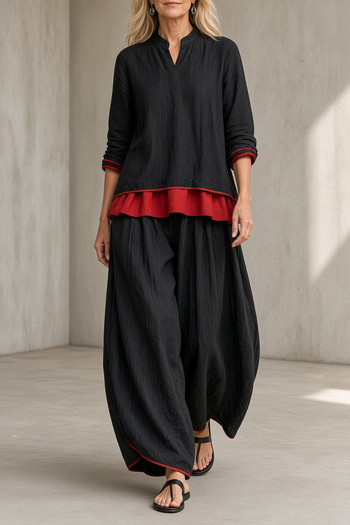 Marietta layered tunic and balloon trouser set in black, front view