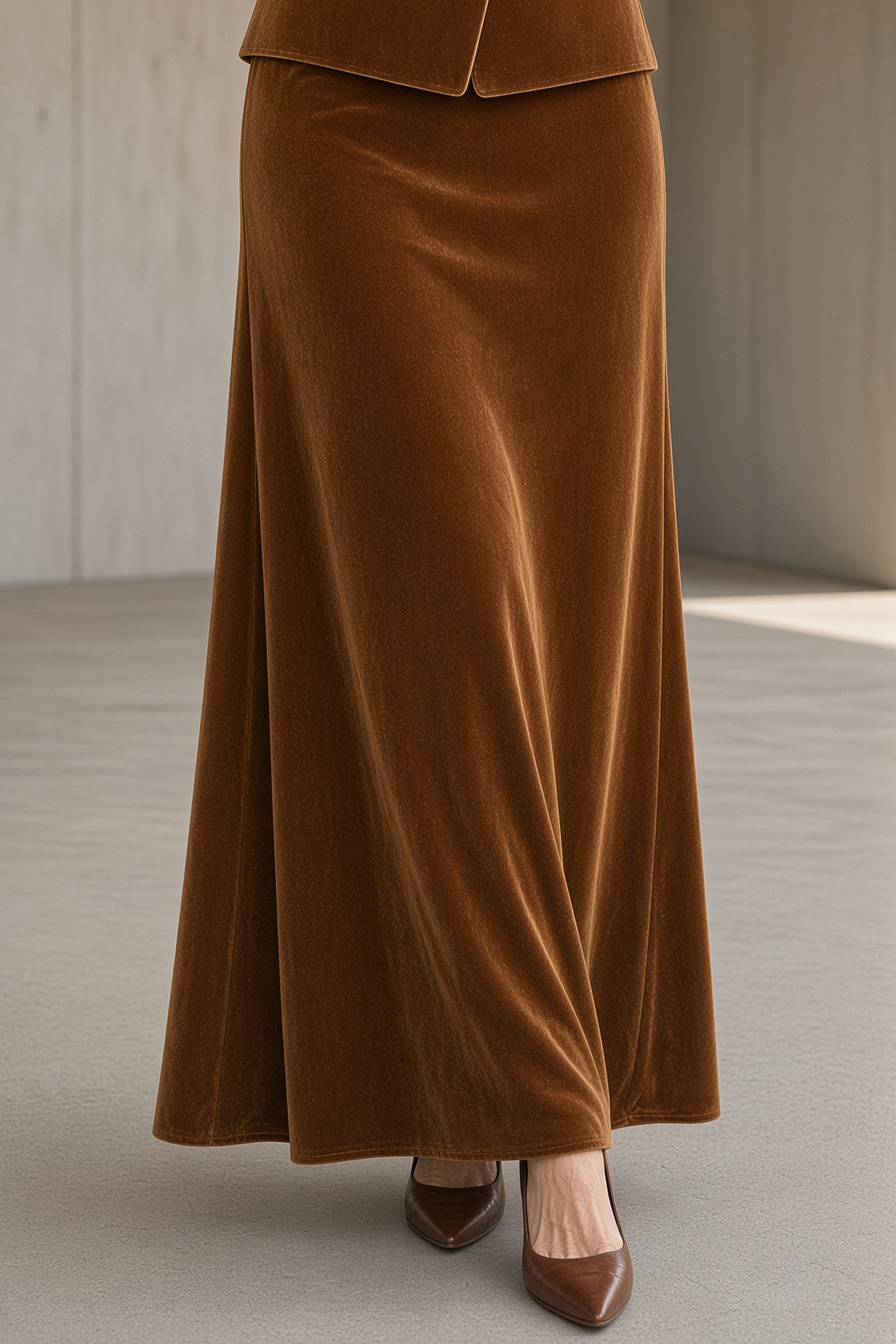 Ethelind velvet blazer maxi dress in brown, close-up of skirt