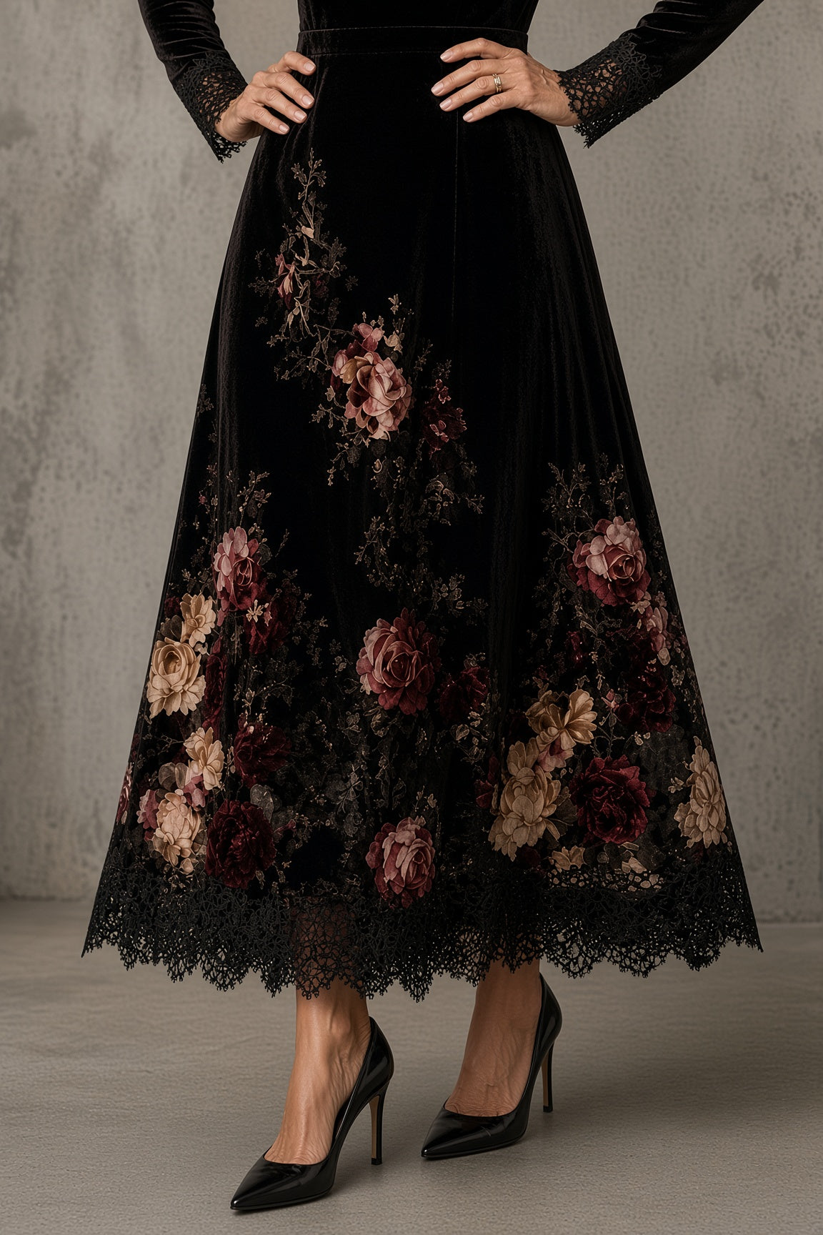 Emberly velvet maxi dress, detail of rose print skirt and lace hem