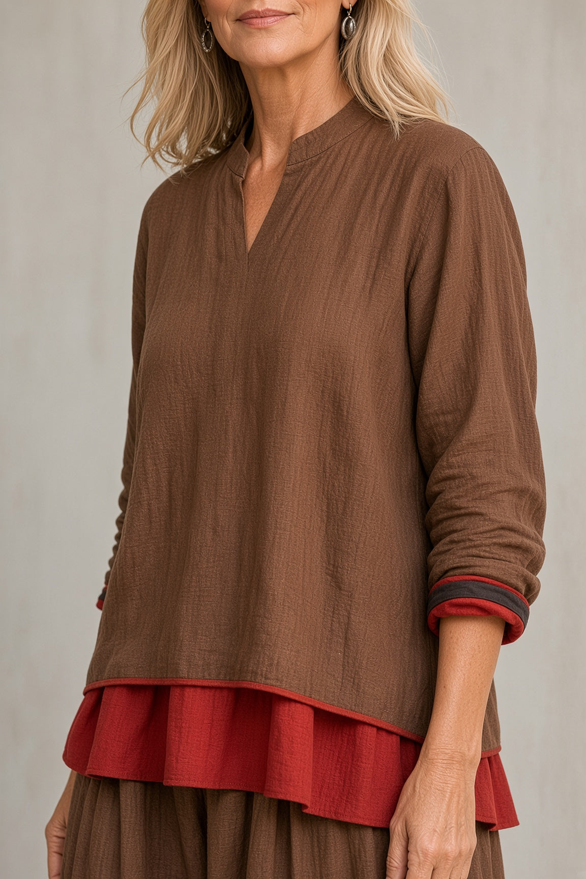 Marietta layered tunic and balloon trouser set in brown, close-up of tunic and cuffs