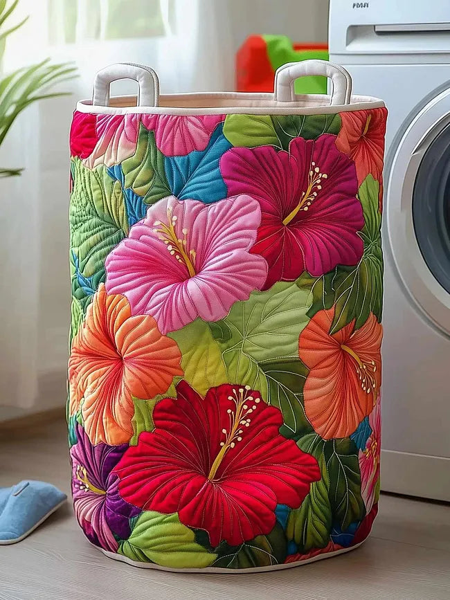 Amalia hand-quilted laundry basket with pink and red hibiscus flowers, front view