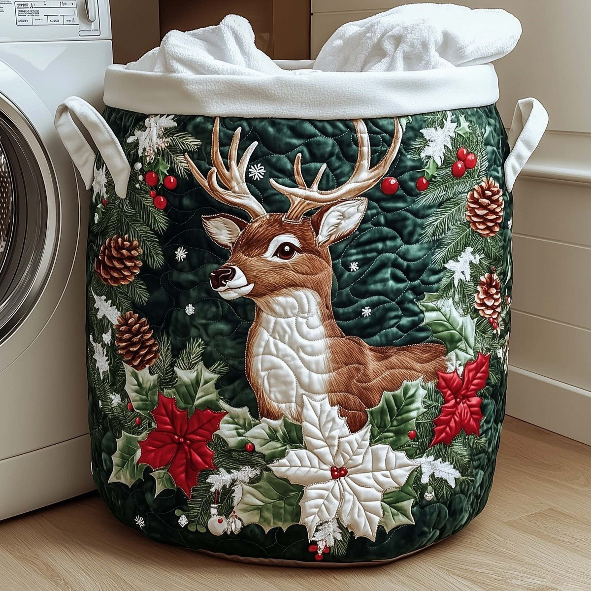 Ivana hand-quilted laundry basket with a deer framed by holly, pine cones and poinsettias, front view