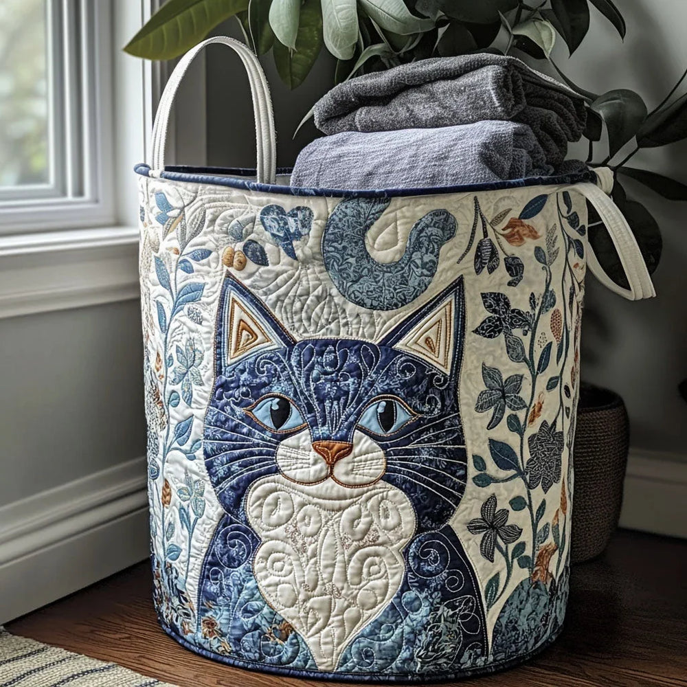 Francesca hand-quilted laundry basket with an indigo blue cat and florals on cream, front view