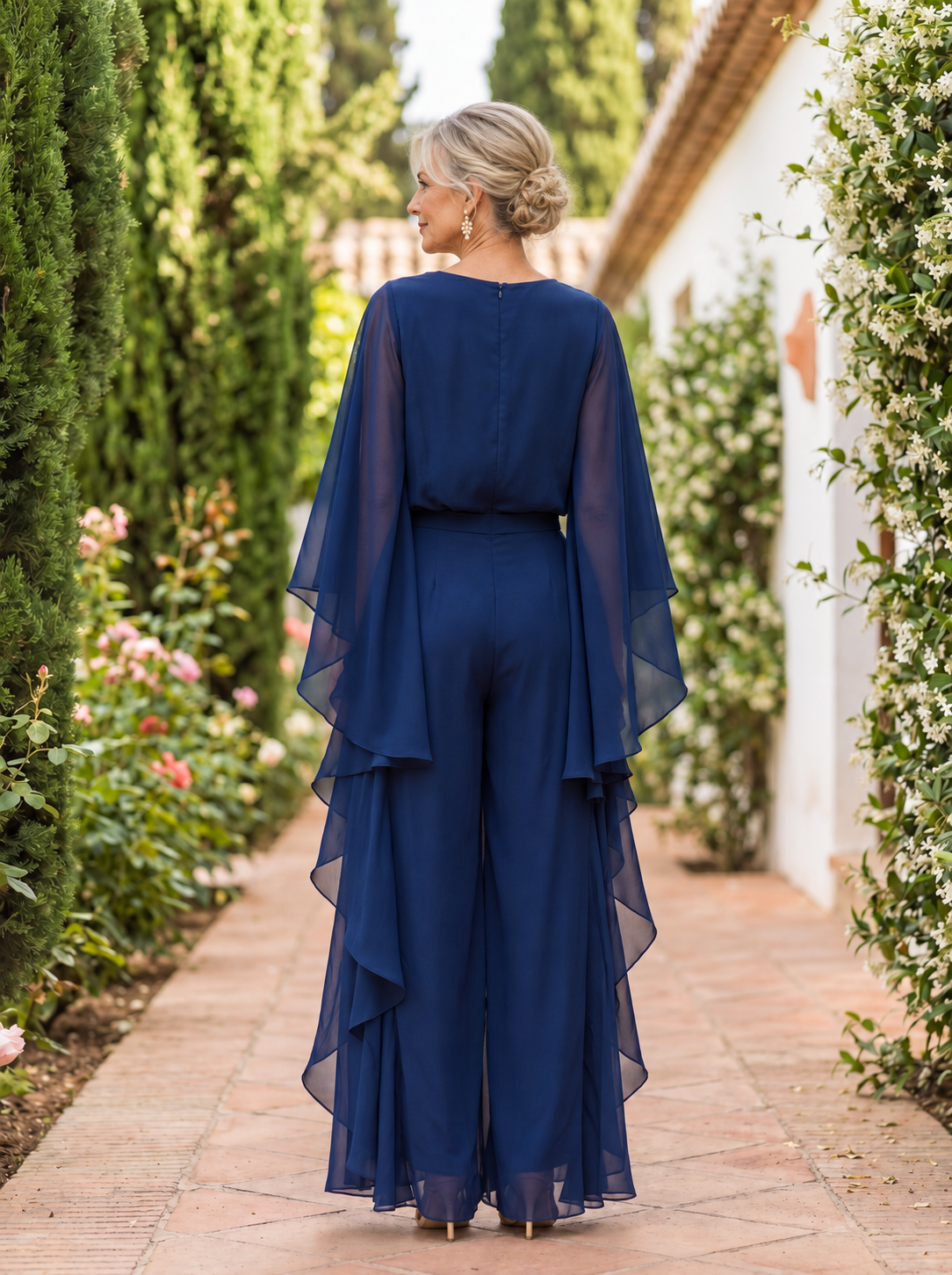 Lenorah cape-sleeve trouser set in navy, back view