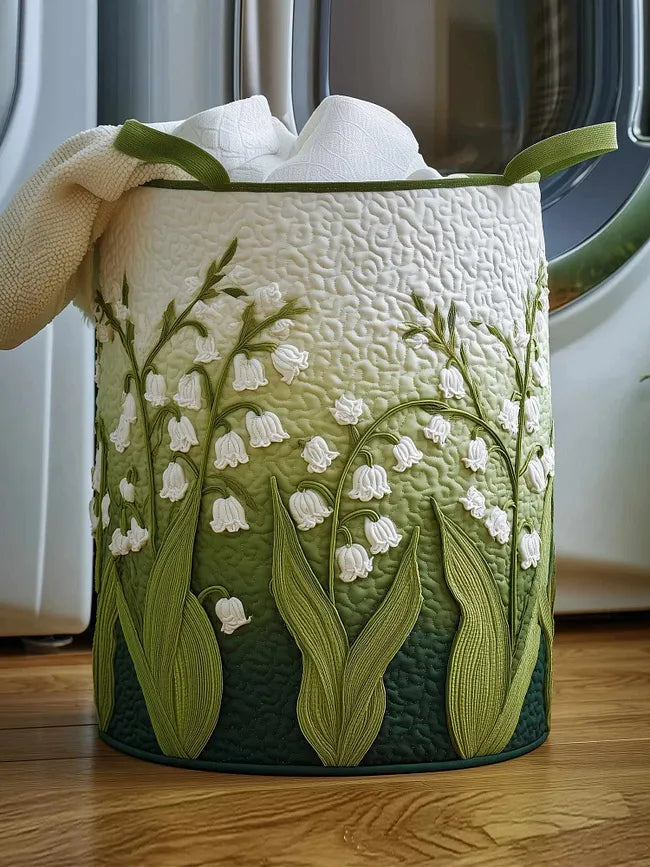 Allegra hand-quilted laundry basket with lily of the valley flowers, front view