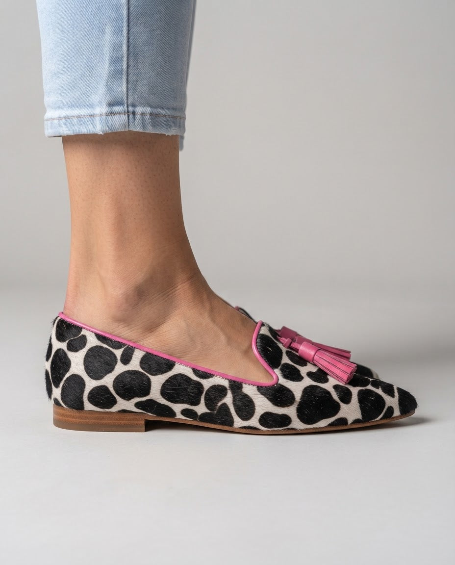 Ginevra | Black & White Cow Print Loafers with Pink Tassels