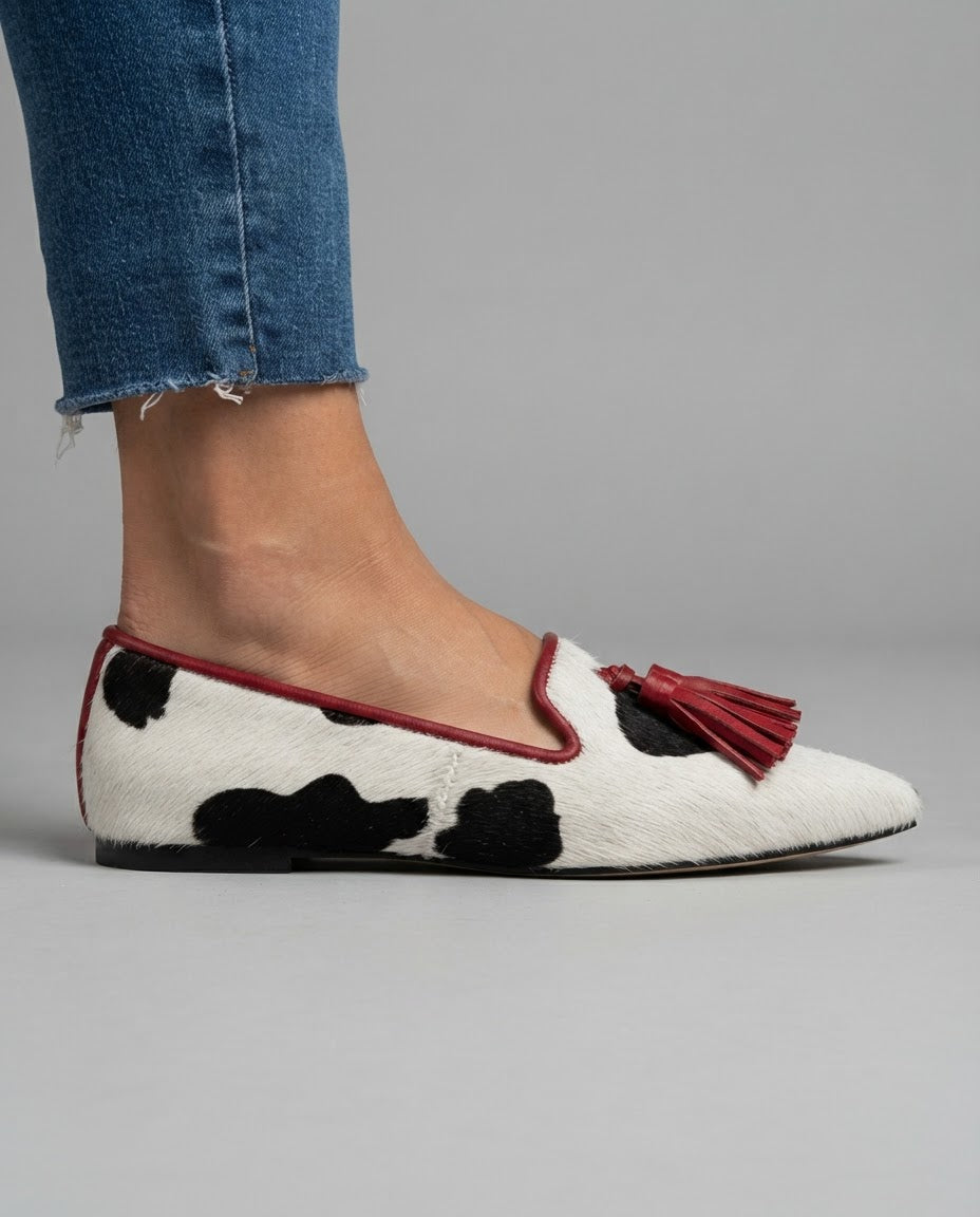 Ginevra | Black & White Cow Print Loafers with Red Tassels