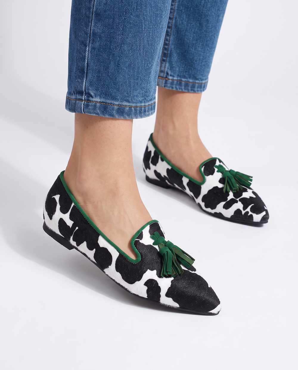 Ginevra | Black & White Cow Print Loafers with Green Tassels