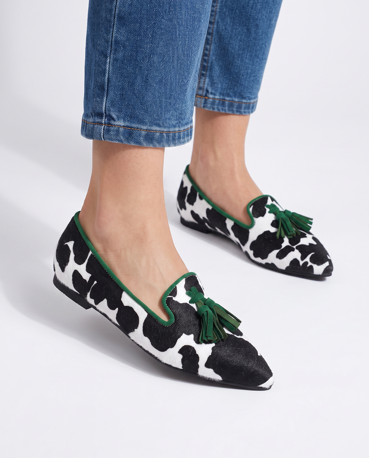 Ginevra | Black & White Cow Print Loafers with Green Tassels