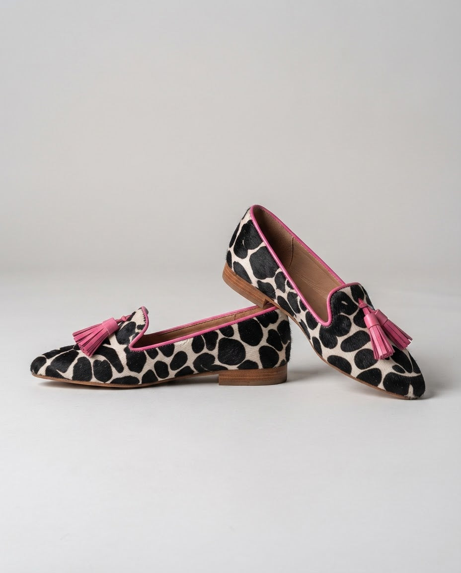 Ginevra | Black & White Cow Print Loafers with Pink Tassels