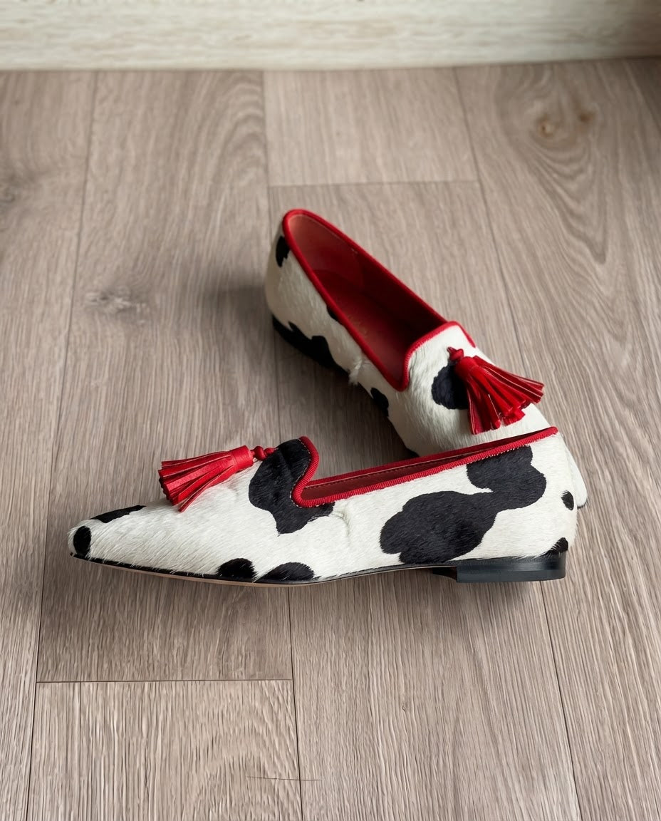 Ginevra | Black & White Cow Print Loafers with Red Tassels