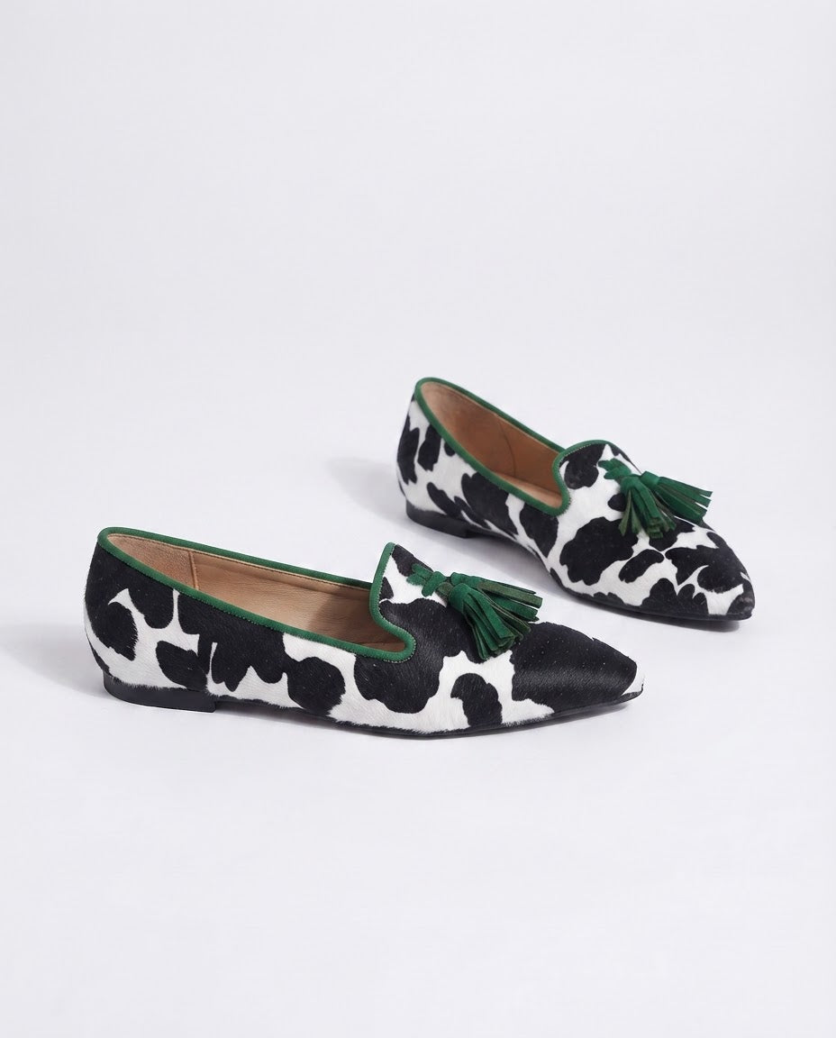 Ginevra | Black & White Cow Print Loafers with Green Tassels