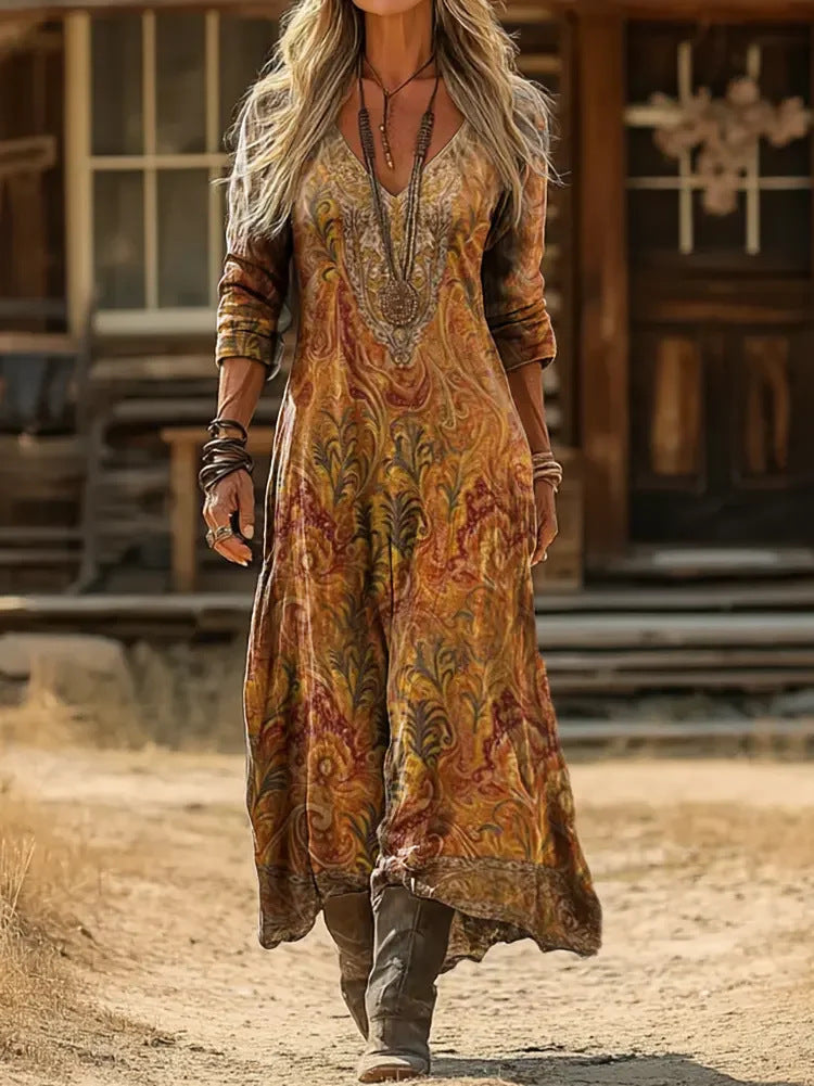 Melora paisley maxi dress in rust and gold, walking view