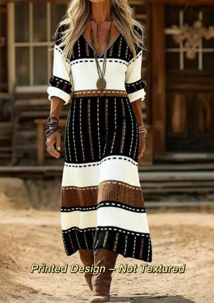 Iona striped maxi dress in black, cream and brown, outdoor walking view