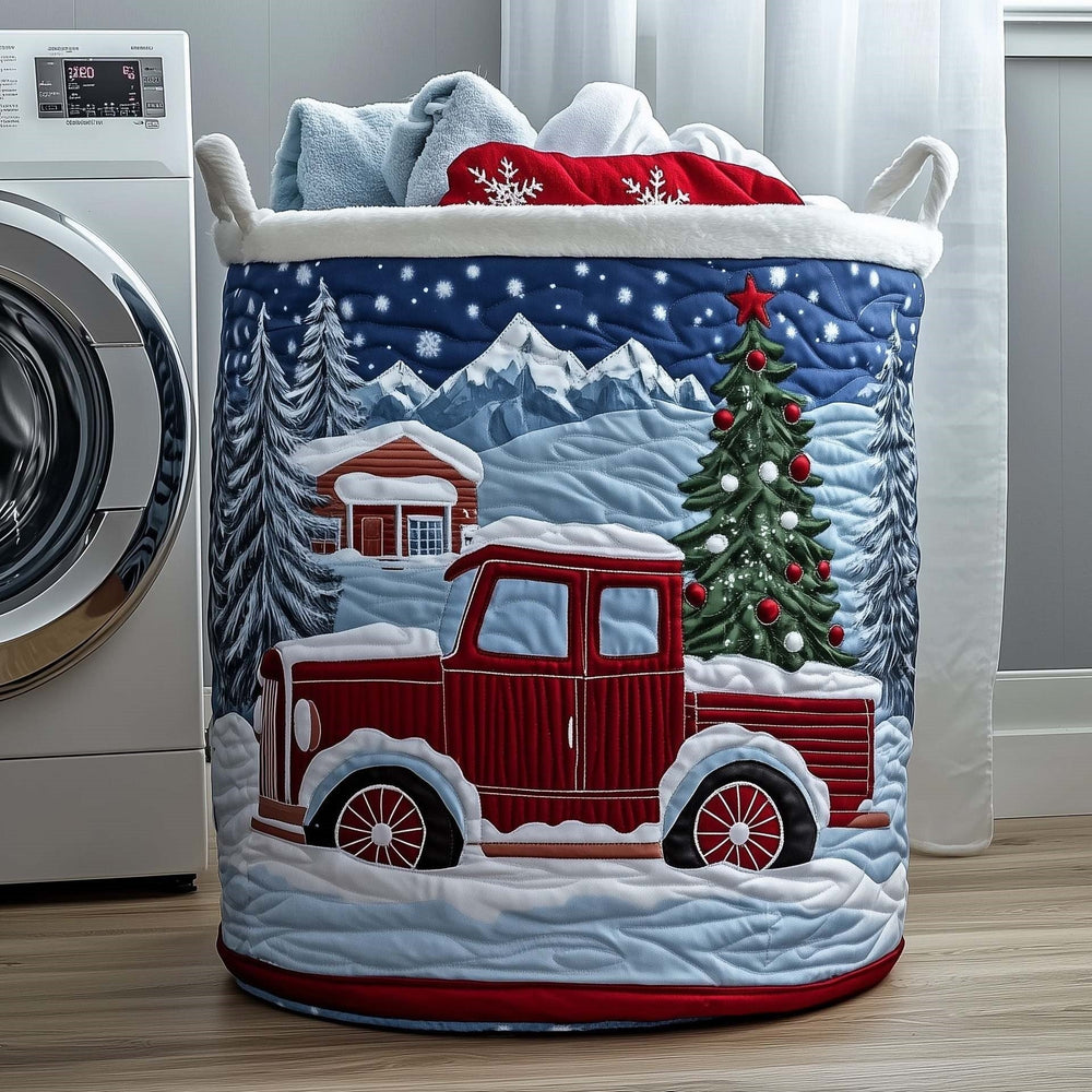 Gina hand-quilted laundry basket with a red truck, a Christmas tree and frosted pines below blue mountains, front view
