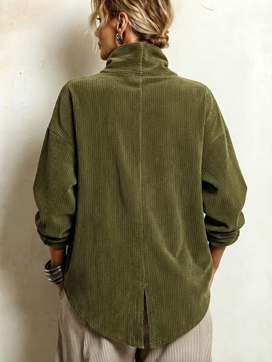 Clemmie corduroy high-neck tunic in olive green, back view with curved hem and centre slit