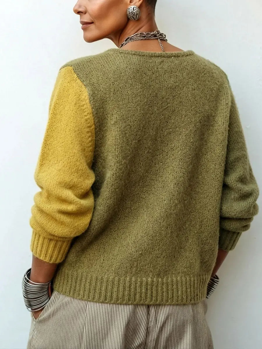 Mirabel oversized colour-block cardigan in olive and mustard, back view with mustard sleeve