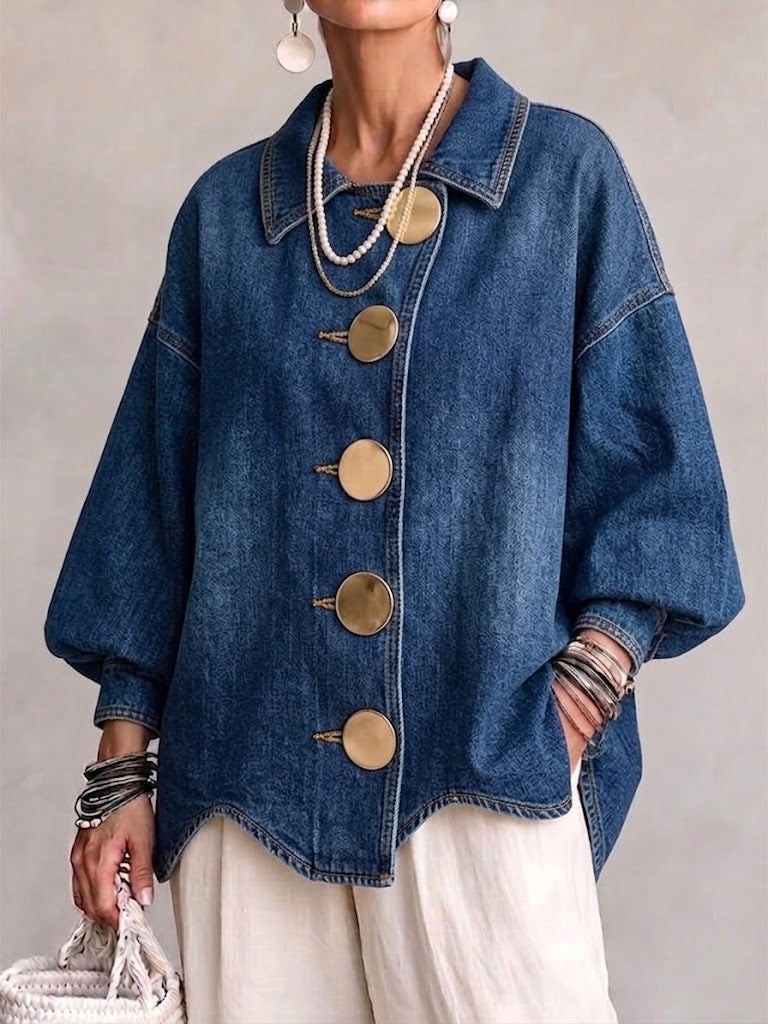 Kirsty oversized denim jacket in blue, front view with maxi gold buttons and wavy hem