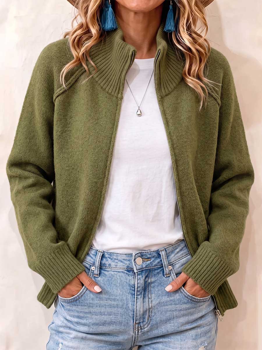 Ottilie zip-up knit cardigan in olive green, front view worn open with ribbed high collar