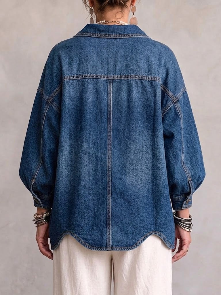 Kirsty oversized denim jacket in blue, back view with wavy hem and lantern sleeves