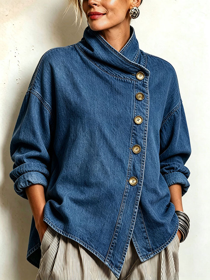 Nerys oversized denim shirt in blue, front view with diagonal gold buttons and high collar