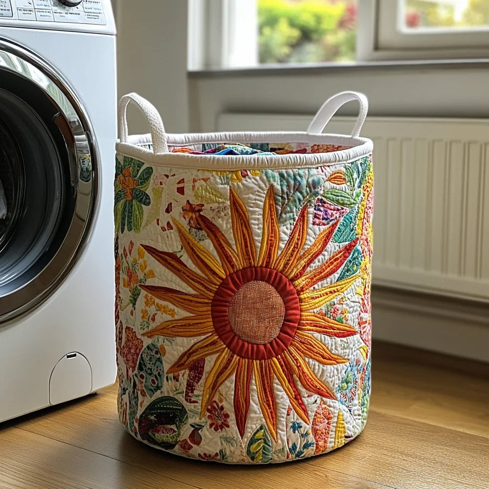 Fedora hand-quilted laundry basket with an orange patchwork sunburst and florals on cream, front view