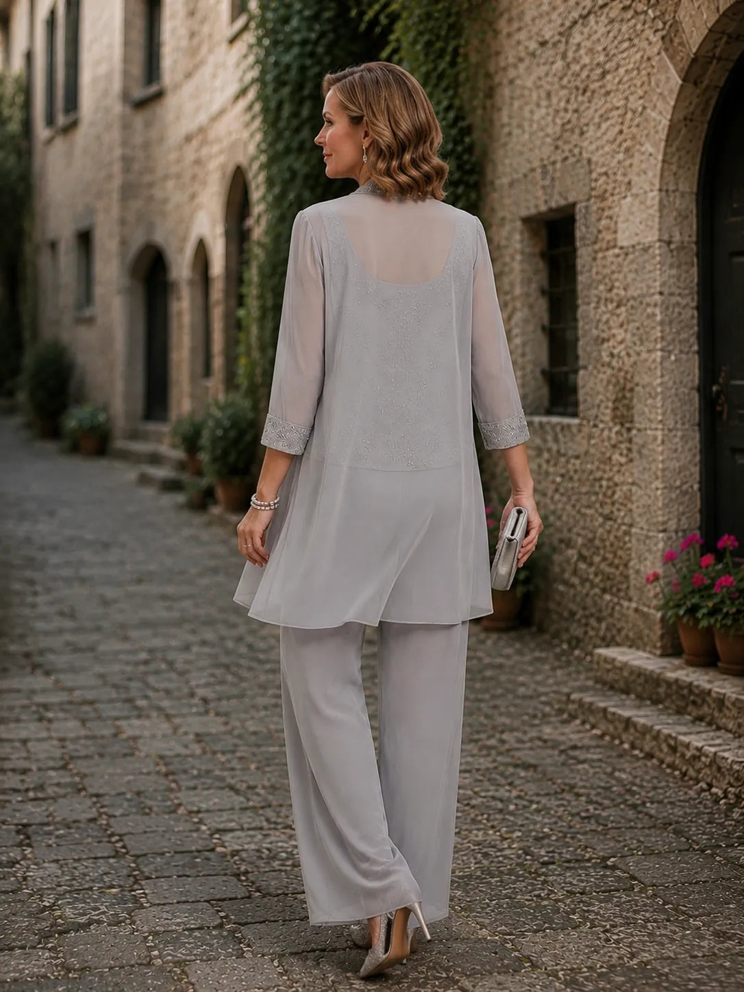 Anthea embroidered three-piece trouser suit in grey, back view of sheer jacket