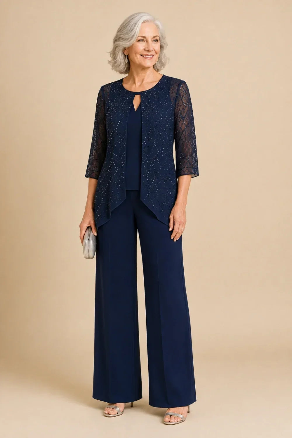 Meredith layered lace trouser suit in navy, full-length front view on silver-haired model