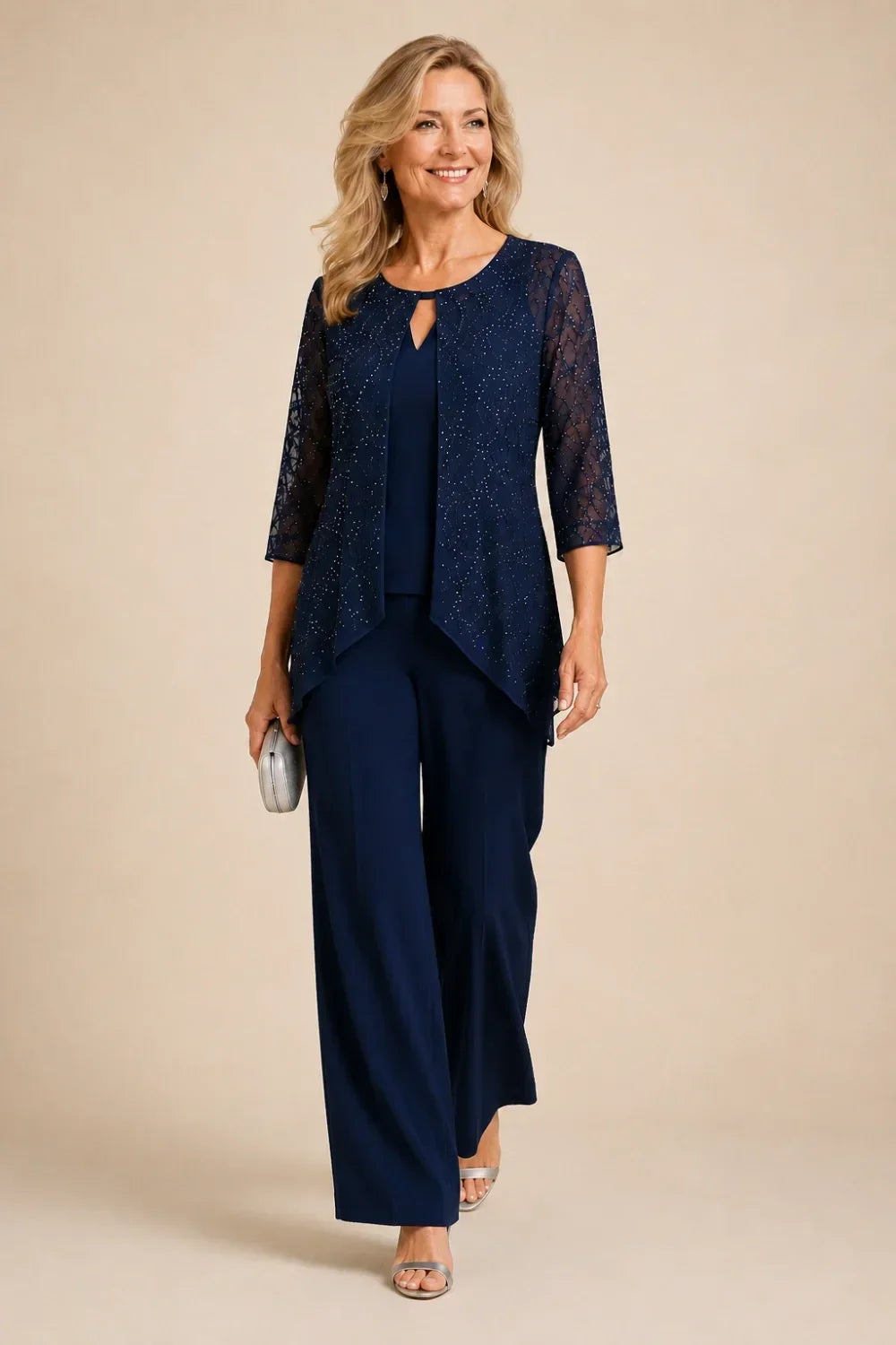 Meredith layered lace trouser suit in navy, full-length walking view