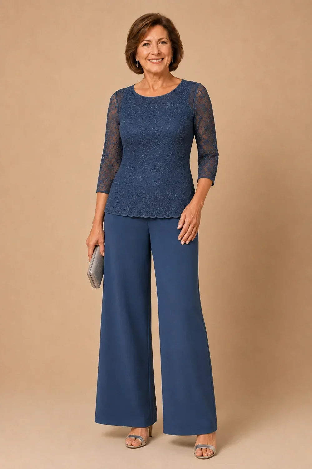 Priscilla beaded lace trouser suit in steel blue, full-length front view with clutch