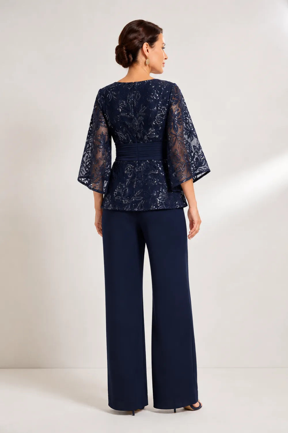 Susannah sequin bell-sleeve trouser suit in navy, full-length back view