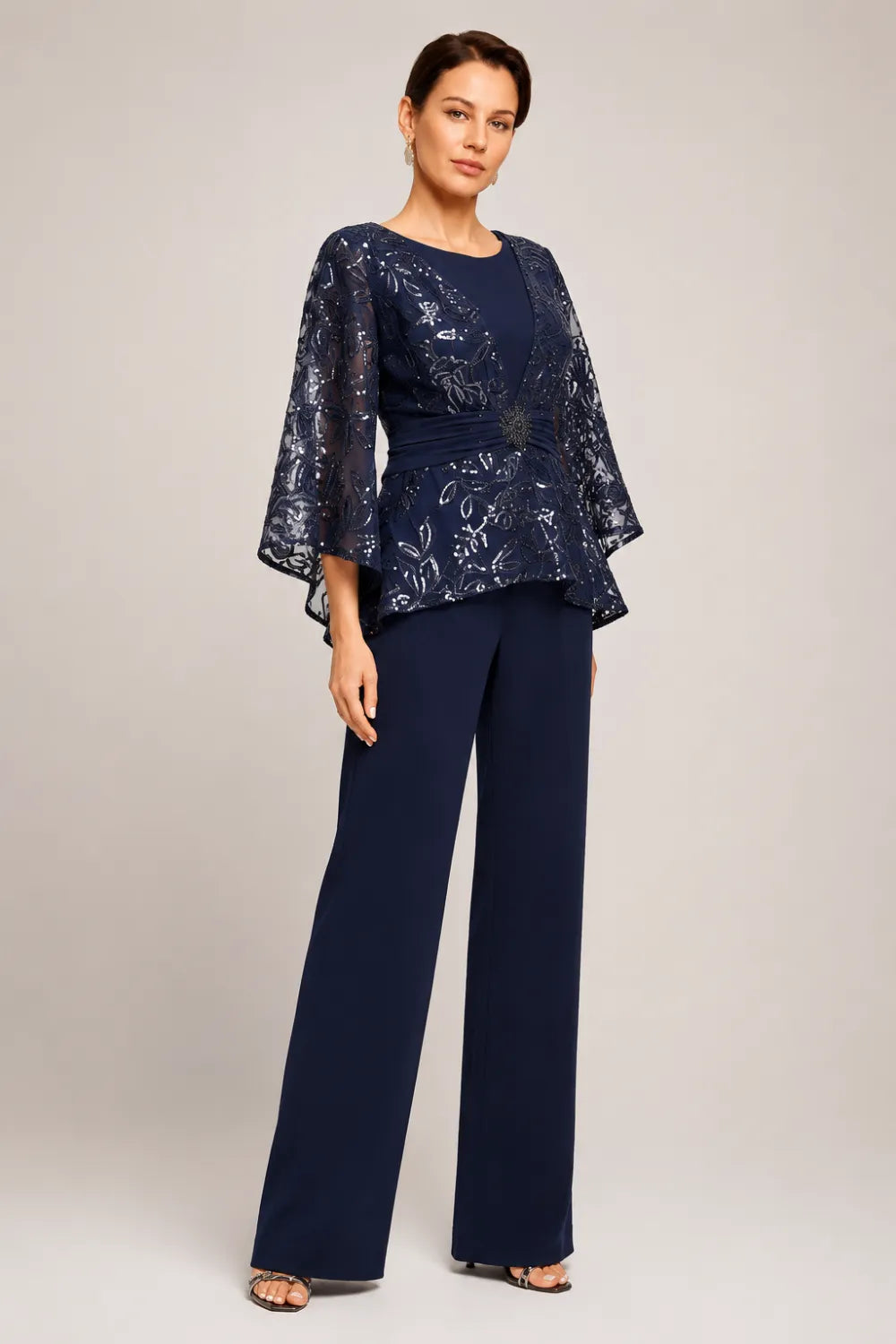 Susannah sequin bell-sleeve trouser suit in navy, full-length three-quarter view
