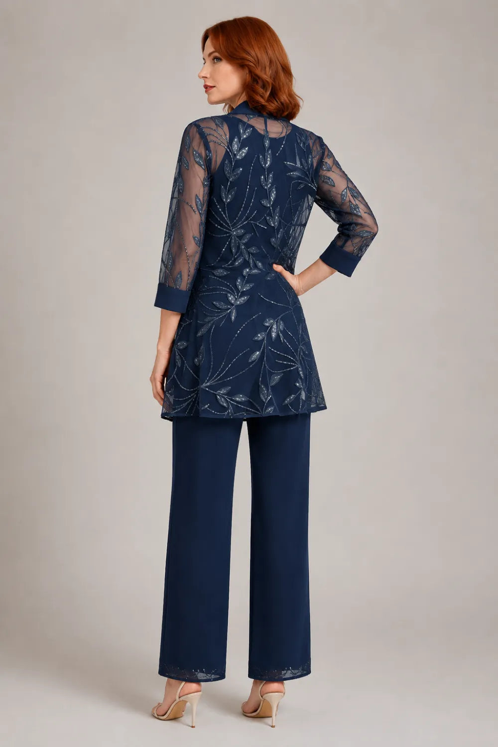 Genevieve three-piece sequin trouser suit in navy, back view of sheer embroidered jacket