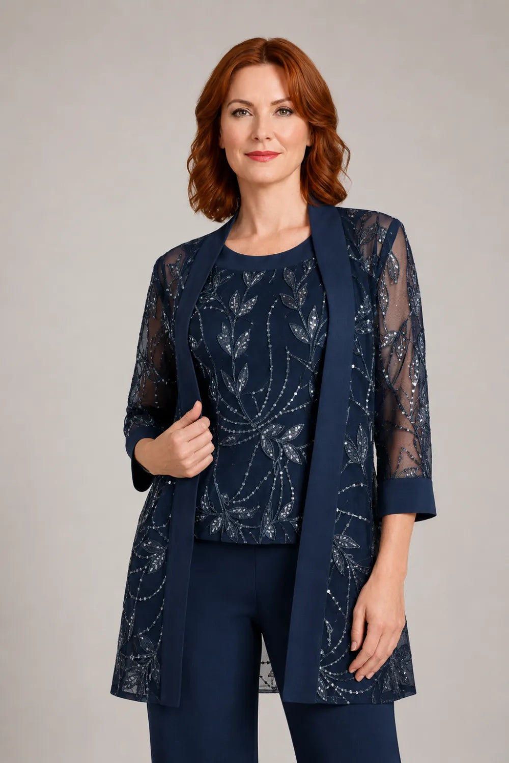 Genevieve three-piece sequin trouser suit in navy, close-up of sequinned leaf embroidery